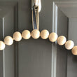 Load image into Gallery viewer, 4th of July Wreath hung by ribbon